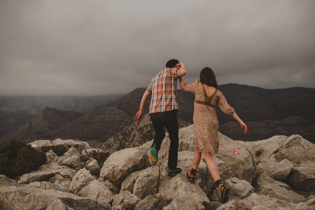 Sitting person looking the mountain during daytimee photo – Free Grey Image  on Unsplash